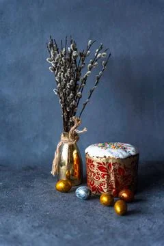 Happy Easter bread. Festive cake with traditional decor. Eggs, willow, trendy Stock Photos