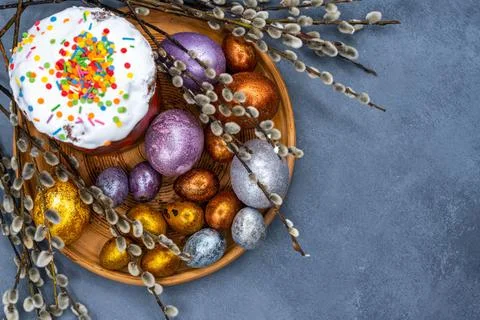 Happy Easter bread. Festive cake with traditional decor. Eggs, willow, trendy Stock Photos