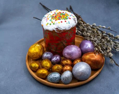 Happy Easter bread. Festive cake with traditional decor. Eggs, willow, trendy Stock Photos