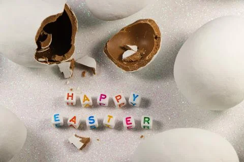 Happy Easter Broken Chocolate Candy Egg With Text Foto stock