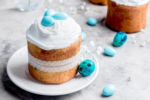 Happy Easter Card. Traditional Easter sweet bread decorated meringue and bl.. Stock Photos