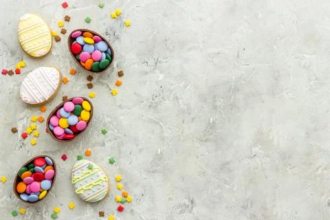 Happy Easter with chocolate eggs and sweets. Space for text Stockfoto's