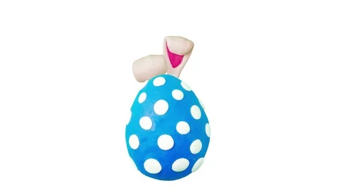 Happy Easter in Clay. Rabbit and eggs. Alpha matte. 4K Stock Footage 72845194