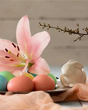Happy easter colored eggs with flower and branch Fotos Stock