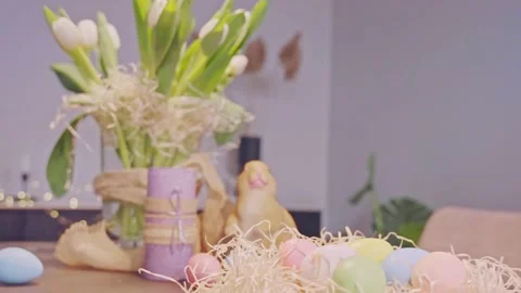 Happy Easter! Colorful Easter eggs on wooden plate for a spring celebration. Stock Footage 236341738
