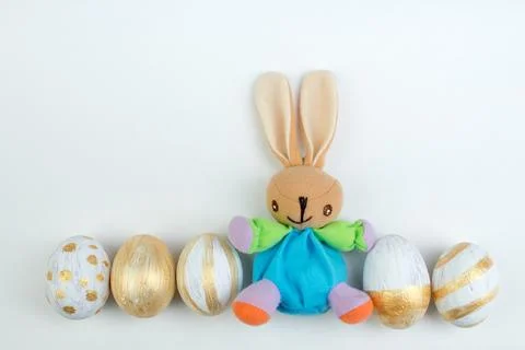 Happy Easter. Colorful easter eggs and rabbit on isolated white background. 스톡 사진