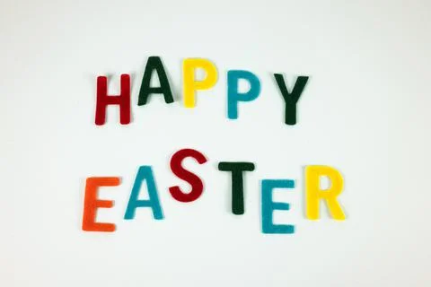Happy Easter in colors on the white background Stock Photos