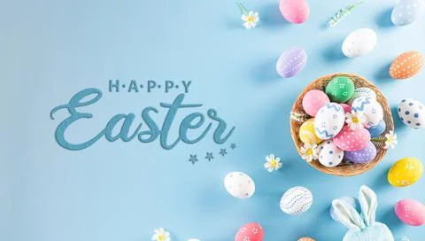 Happy easter! Colourful of Easter eggs in the nest with rabbit on pastel blue Stock Photos