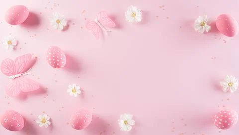 Happy easter! Colourful of Easter eggs in with flower on pastel pink backgrou Stock Photos