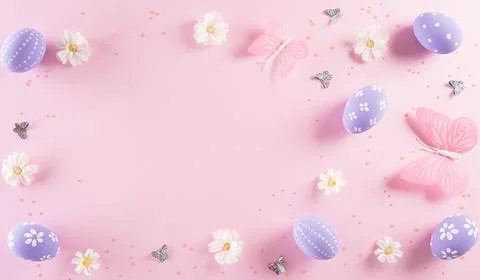 Happy easter! Colourful of Easter eggs in with flower on pastel pink backgrou Stock Photos