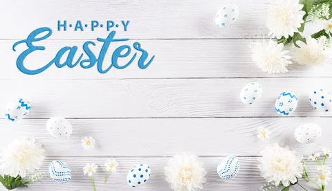 Happy easter! Colourful of Easter eggs in with flower on white wooden backgro Stock Photos