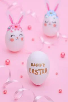 Happy Easter composition on a pink background. Stock Photos