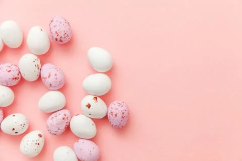 Happy Easter concept. Easter candy chocolate eggs and jellybean sweets isolated Stock Photos