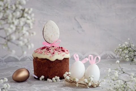 Happy Easter concept. Easter light table with Easter cakes and colored eggs.. Stock Photos