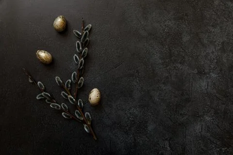 Happy Easter concept. Preparation for holiday. Golden decorated easter eggs w Stock Photos