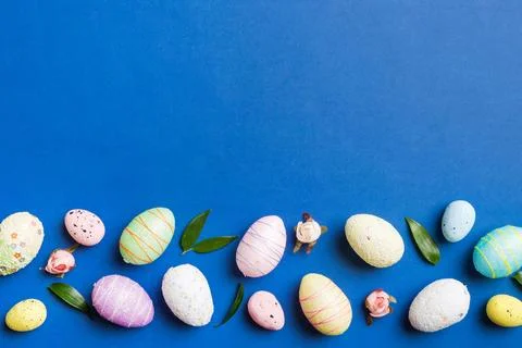 Happy Easter concept. Preparation for holiday. Easter eggs on colored backg.. Stock Photos