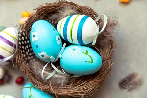 Happy Easter concept. Preparation for holiday. Colorful decorated blue east.. Stock Photos