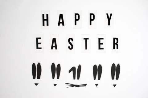 Happy Easter congratulation, greetings lined with letters and funny bunny Stock Photos