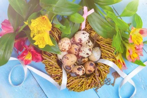 Happy Easter. Congratulatory easter background. Easter eggs and flowers. Stock Photos