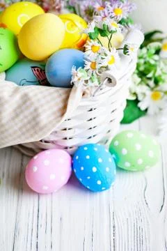 Happy Easter. Congratulatory easter background. Easter eggs and flowers. Back Stock Photos