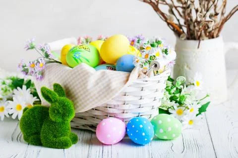 Happy Easter. Congratulatory easter background. Easter eggs and flowers. Back Stock Photos