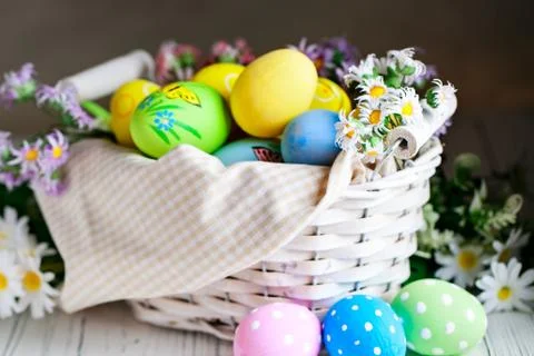Happy Easter. Congratulatory easter background. Easter eggs and flowers. Back Stock Photos