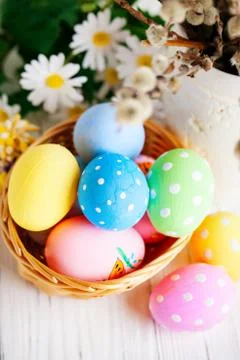 Happy Easter. Congratulatory easter background. Easter eggs and flowers. Back Stock Photos