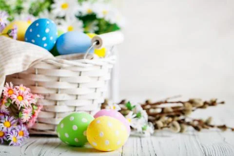 Happy Easter. Congratulatory easter background. Easter eggs and flowers. Back Stock Photos