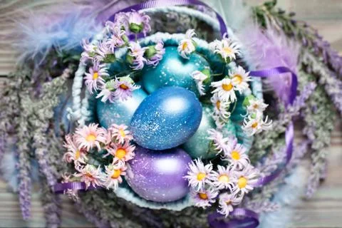 Happy Easter. Congratulatory easter background. Easter eggs and flowers. Back Stock Photos