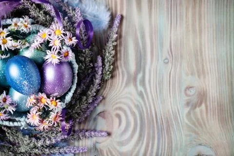 Happy Easter. Congratulatory easter background. Easter eggs and flowers. Back Stock Photos
