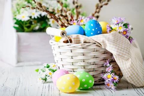 Happy Easter. Congratulatory easter background. Easter eggs and flowers. Back Stock Photos