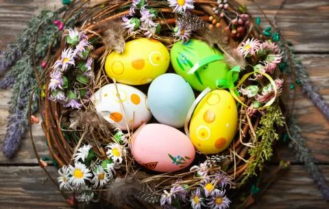 Happy Easter. Congratulatory easter background. Easter eggs and flowers. Back Stock Photos