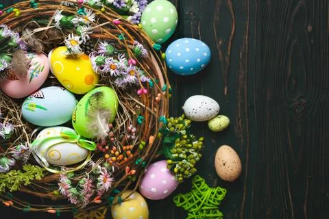 Happy Easter. Congratulatory easter background. Easter eggs and flowers. Back Stock Photos