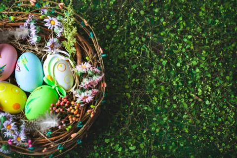 Happy Easter. Congratulatory easter background. Easter eggs and flowers. Back Stock Photos