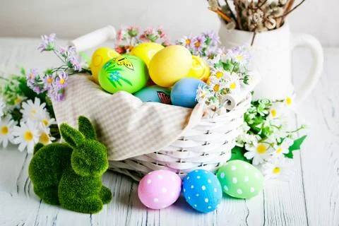Happy Easter. Congratulatory easter background. Easter eggs and flowers. Back Stock Photos