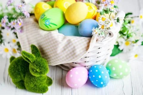 Happy Easter. Congratulatory easter background. Easter eggs and flowers. Back Stock Photos