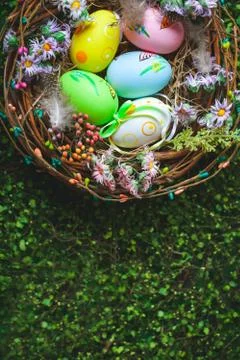 Happy Easter. Congratulatory easter background. Easter eggs and flowers. Back Stock Photos