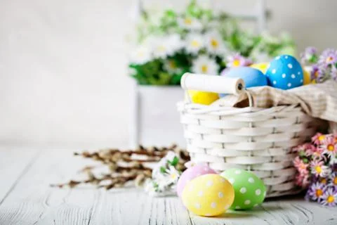 Happy Easter. Congratulatory easter background. Easter eggs and flowers. Back Stock Photos