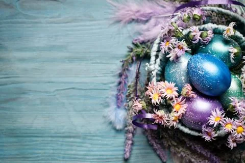 Happy Easter. Congratulatory easter background. Easter eggs and flowers. Back Stock Photos