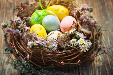 Happy Easter. Congratulatory easter background. Easter eggs and flowers. Back Stock Photos