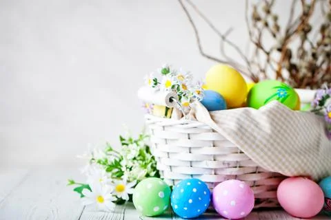 Happy Easter. Congratulatory easter background. Easter eggs and flowers. Back Stock Photos