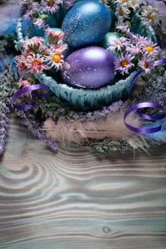 Happy Easter. Congratulatory easter background. Easter eggs and flowers. Back Stock Photos