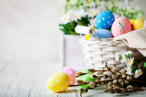 Happy Easter. Congratulatory easter background. Easter eggs and flowers. Back Stock Photos