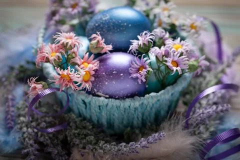 Happy Easter. Congratulatory easter background. Easter eggs and flowers. Back Stock Photos