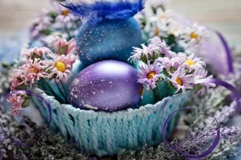 Happy Easter. Congratulatory easter background. Easter eggs and flowers. Back Stock Photos