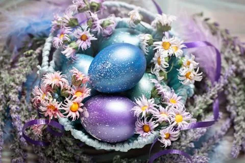 Happy Easter. Congratulatory easter background. Easter eggs and flowers. Back Stock Photos