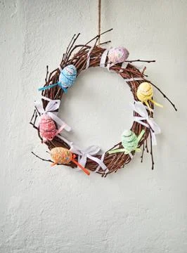 Happy Easter. Congratulatory easter background. Easter eggs and flowers. Stock Photos