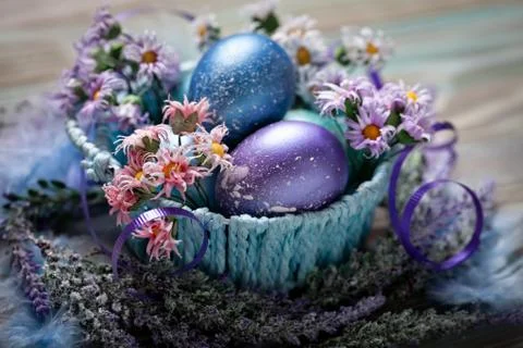 Happy Easter. Congratulatory easter background. Easter eggs and flowers. Back Stock Photos