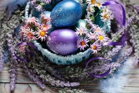 Happy Easter. Congratulatory easter background. Easter eggs and flowers. Back Stock Photos