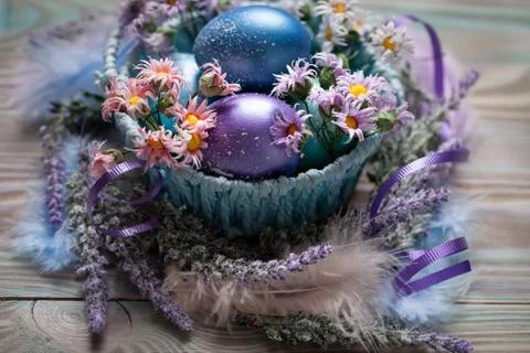 Happy Easter. Congratulatory easter background. Easter eggs and flowers. Back Stock Photos
